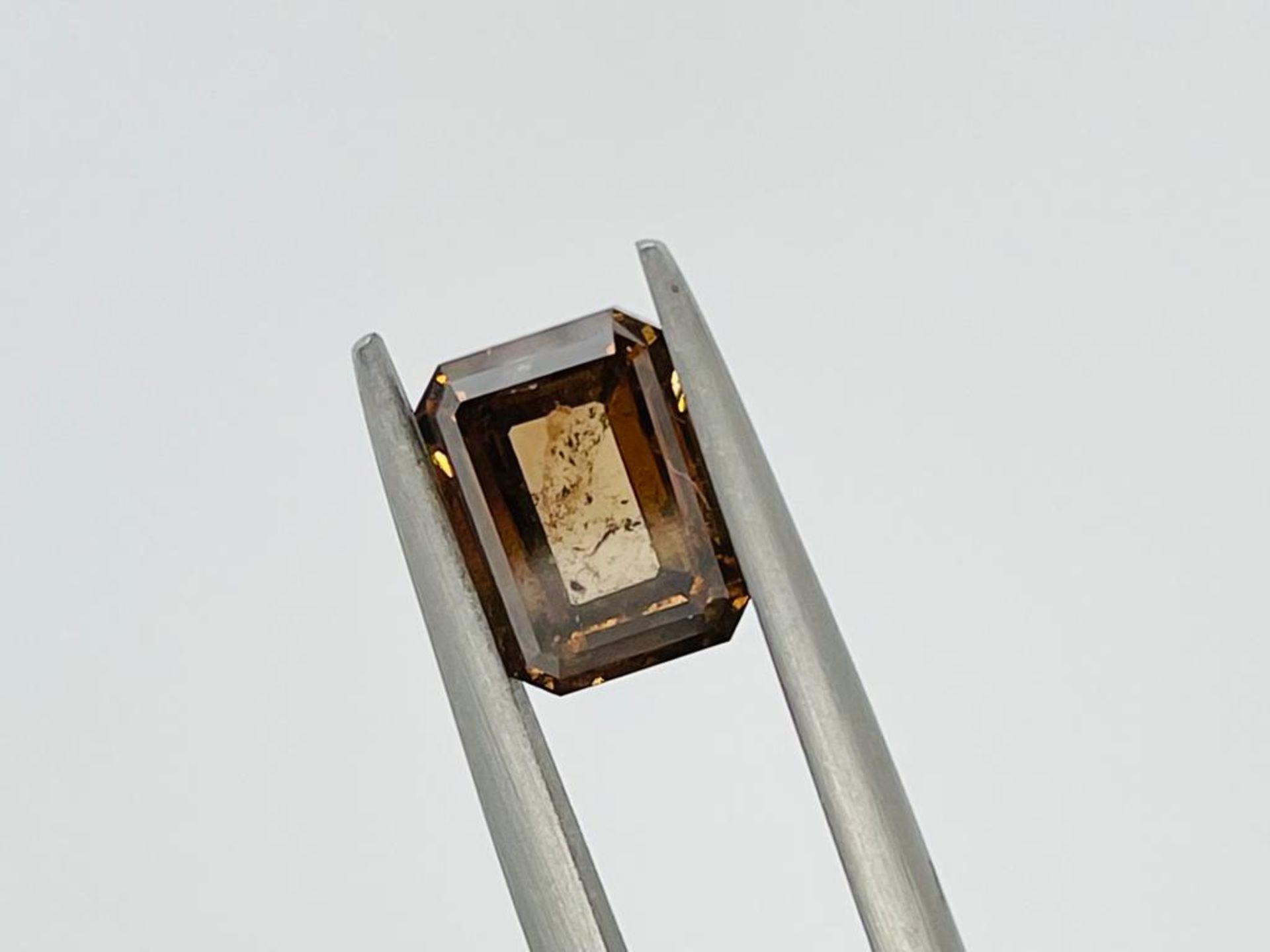 1 DIAMOND CLARITY ENHANCED 2,69 CT N.F. DEEP ORANGE BROWN - SI2 - SHAPE EMERALD - CERT NONE - - Bild 4 aus 4