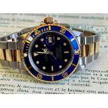 Brand: ROLEX Submariner Date model (watch) Reference number 16613 Automatic charge Material of the