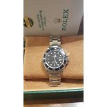 Brand: ROLEX Submariner Date model (watch) Reference number 16800 Automatic charge Material of the