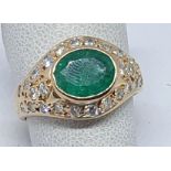 18 K 5 K GRAMS RING WITH OVAL CENTRAL EMERALD FROM CTS 2 AND SIDE DISH OF DIAMONDS COLOR G VVS -