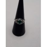 ANCIENT HANDMADE RING WITH DIAMOND ROSETTE IN OUTLINE OF AN OVAL GREEN EMERALD FROM 1.00 CT WEIGHT