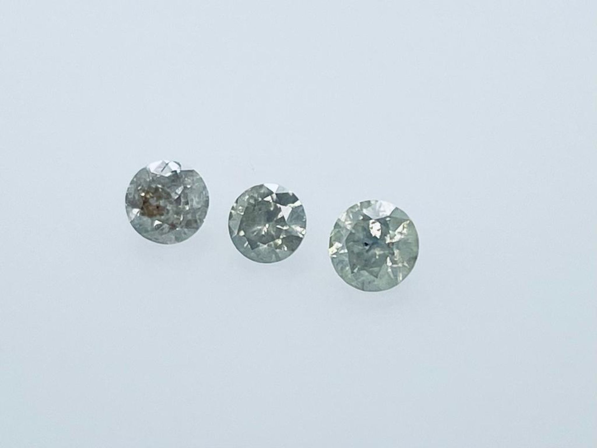 3 DIAMONDS 1.57 CT TOTAL K -M - I3 - BRILLIANT CUT - ID CERTIFICATE - C20306-12H