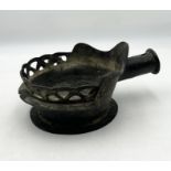 A bronze Chinese silk iron