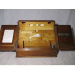 An Edwardian stationary box with manual day/date calendar