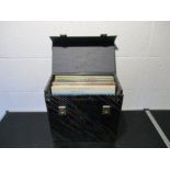 A collection of Cliff Richard 12" vinyl records in carry case (approx. 32 in total)