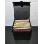 A carry case full of 7" vinyl singles including The Rolling Stones, Elton John, Status Quo, ELO, The