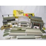 A collection of various Trix Twin Railway "Many-Ways" buildings, including three main buildings,