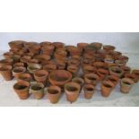 A collection of terracotta flower pots