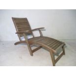 A garden wooden steamer chair