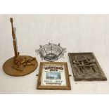 A collection of items including a small Hunters Ale mirrored advertising sign, carved wooden