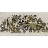 A large collection of silver plated items including salt & pepper sets, trophies etc