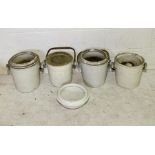 Four white ceramic slop buckets with bamboo handles