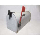 A vintage metal US mail box - approved by the Post Master Ceneral