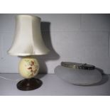 A lamp formed around a hand painted Ostrich egg, plus a modern ceiling light.