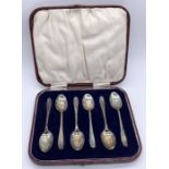 A cased set of hallmarked silver coffee spoons