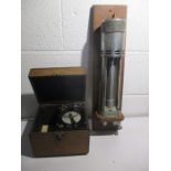 A Western Electric Co. crystal receiving set along with a laboratory max/min thermometer by Casella