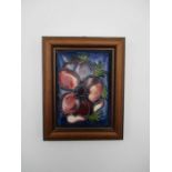 A Moorcroft rectangular lid in wooden frame - overall size 16cm x 12cm