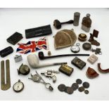 An interesting collection of items including pocket watches and case, vintage false teeth, smoking