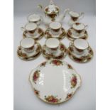 A Royal Albert "Old County Roses" part tea set including teapot, six trios, creamer jug, sugar