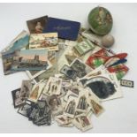 A small collection of various vintage postcards, cigarette cards - including Ogden's, May Blossom