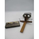 A stereoscope made by Underwood & Underwood of New York with a selection of slides featuring