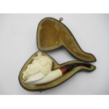 A cased Akdolu Meerschaum pipe carved in the form of Bacchus