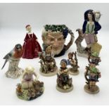 A collection of various ornaments including a Staffordshire flat backed man and goat, Royal
