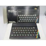 A boxed Sinclair ZX Spectrum personal computer (48K RAM) with power unit and cable - untested