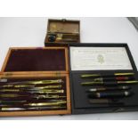 A Charles Roberson cased chalk drawing set, W. Hall brass drawing set dated 1891 and a portable