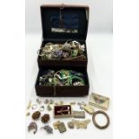A collection of costume jewellery including brooches, bracelets etc.