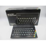 A boxed Sinclair ZX Spectrum personal computer, with power cable and manuals - 48K Ram