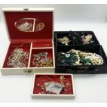 A collection of costume jewellery in two boxes