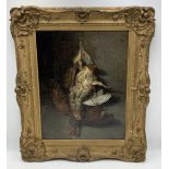 An early 19th Century oil on canvas depicting game birds. Indistinct monogram ( possibly G J T)