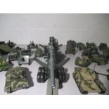 A collection of play worn military die cast models, including Dinky, Corgi and Matchbox. (over two