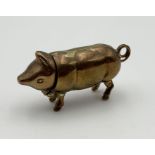 A silver gilt vesta case in the form of a pig