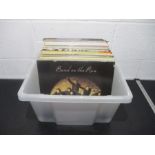 A collection of 12" vinyl records including Elton John, Wings, The Shadows, Neil Diamond, Gladys