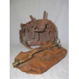 A vintage leather Gladstone bag along with a leather satchel