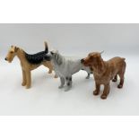 Three Beswick dog ornaments - Airedale Terrier Cast Iron Monarch, English Setter Bayldome Bardi,