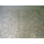 A large beige ground eastern rug - 362cm x 278cm