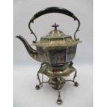 A silver plated spirit kettle on stand