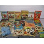 A collection of vintage annuals including Rupert The Bear, Dandy, Beano, The Rover Boy for Boys, The