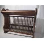 A vintage pine hanging plate rack