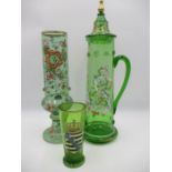 A large enamelled green glass Bohemian jug ( A/F) along with a similar vase and a smaller beaker