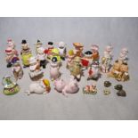 A collection of "Piggies" ceramic figurines including Sow-wester, Hog-wash, Frances Bacon, Billy