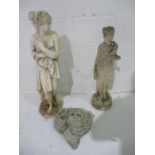 Two composite stone garden figures along with a wall pocket ( A/F)