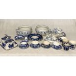 A collection of Victorian and other blue and white china including Chamberpots, Terrines and three