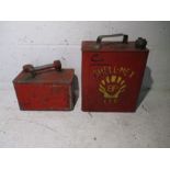Two vintage red petrol cans, one marked Shell-Mex Ltd.