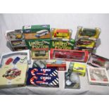 A collection of various boxed die-cast vehicles including Corgi Commercials, Matchbox Models of