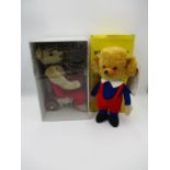 Two boxed Merrythought teddy bears including "Attic Bear On A Trike" & "Mr Twisty Cheeky" - both