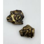 Two Victorian brass vesta cases in the forms of a monkey and lion's head